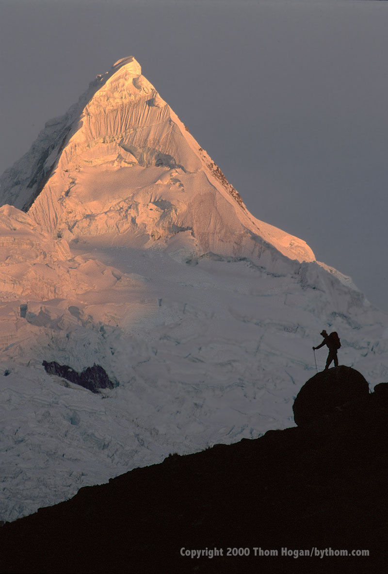 Woman hiker with backpack hiking in Cordillera Blanca, Peru, A